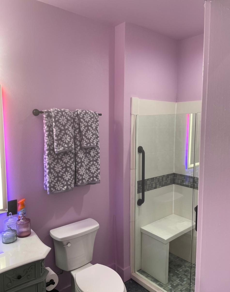 Finished bathroom with custom tile walk-in shower
