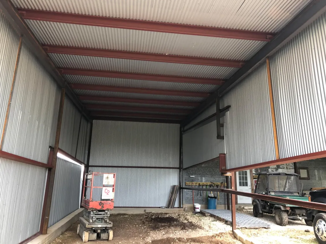 Interior framing and steel structure inside a covered metal building